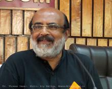Finance Minister T. M. Thomas Isaac