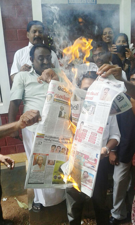 Burning of newspapers at Varkala