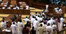Chief Minister Oommen Chandy winding up debate on the Budget as Opposition protests on Feb. 18